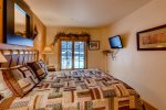 Gaze out to the village while reading a book in bed